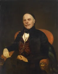 Portrait of a Gentleman in a Red Armchair